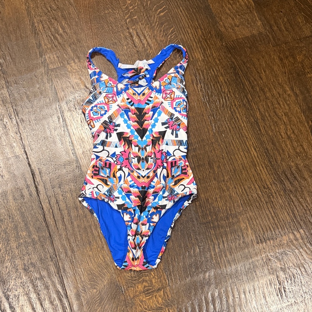BECCA size small one piece NWOT